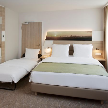 Holiday Inn Frankfurt Airport By Ihg Francoforte sul Meno Esterno foto